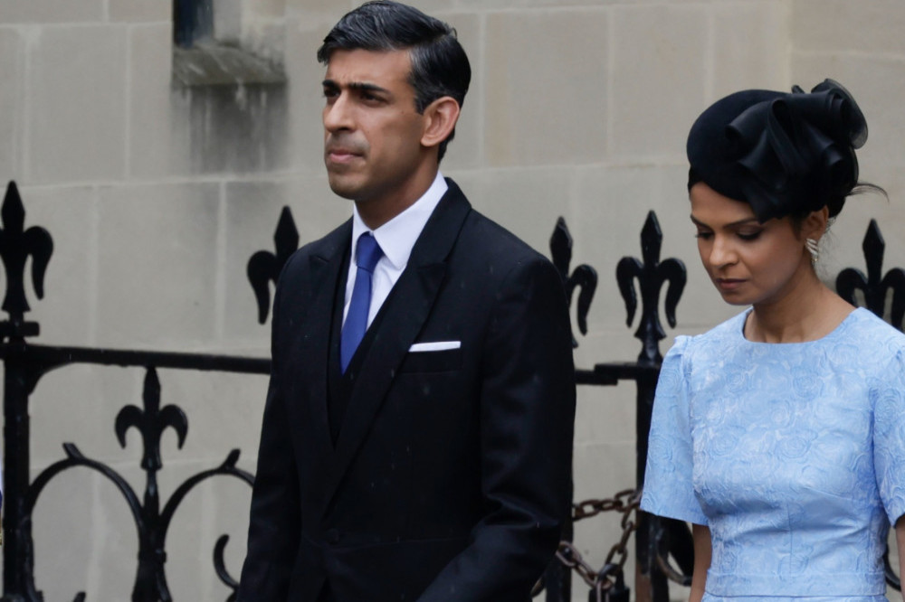 Prime Minister Rishi Sunak and his wife Akshata Murty arriving at King Charles' coronation