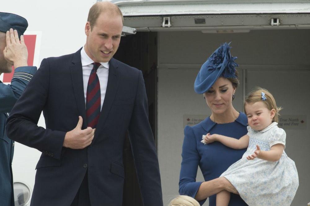 The Duke and Duchess of Cambridge with children Prince George and Princess Charlotte 