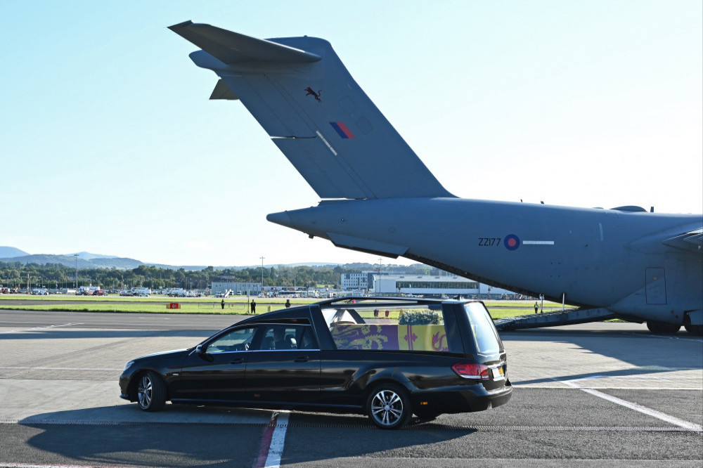Queen Elizabeth’s coffin has arrived in London from Edinburgh and been carried by hearse to her home of 70 years Buckingham Palace