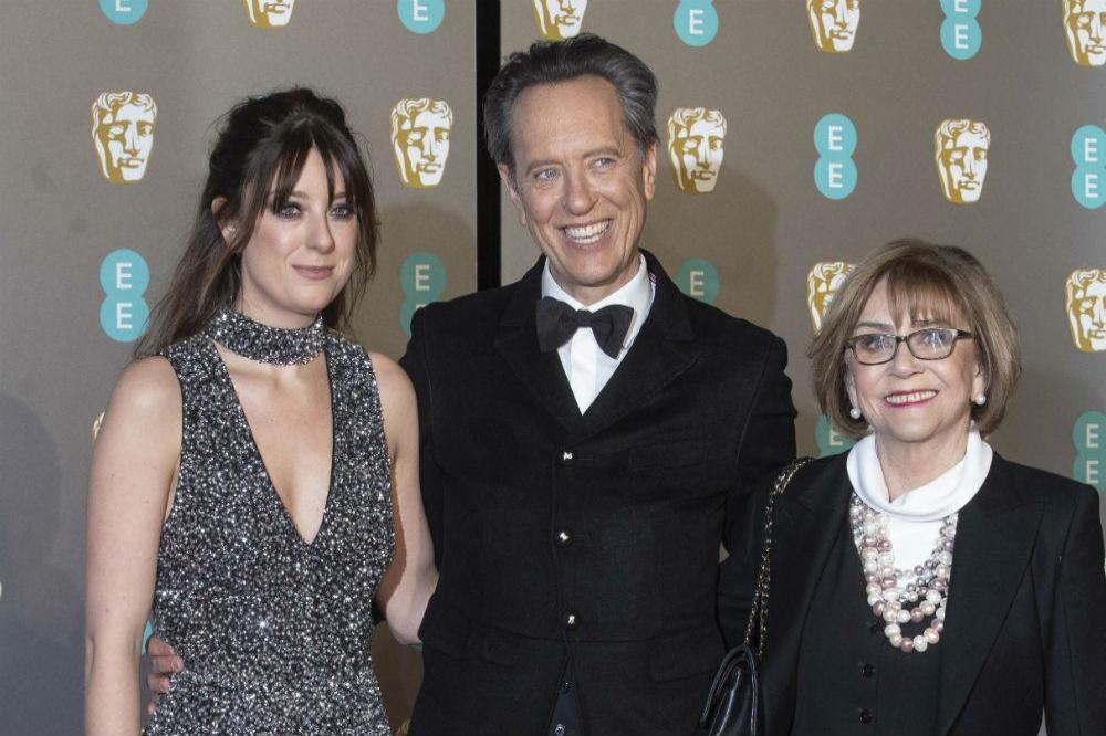 Richard E. Grant with his daughter and wife
