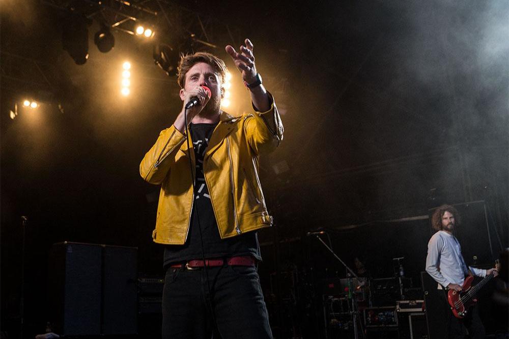Ricky Wilson of the Kaiser Chiefs on stage at Cornbury Festival