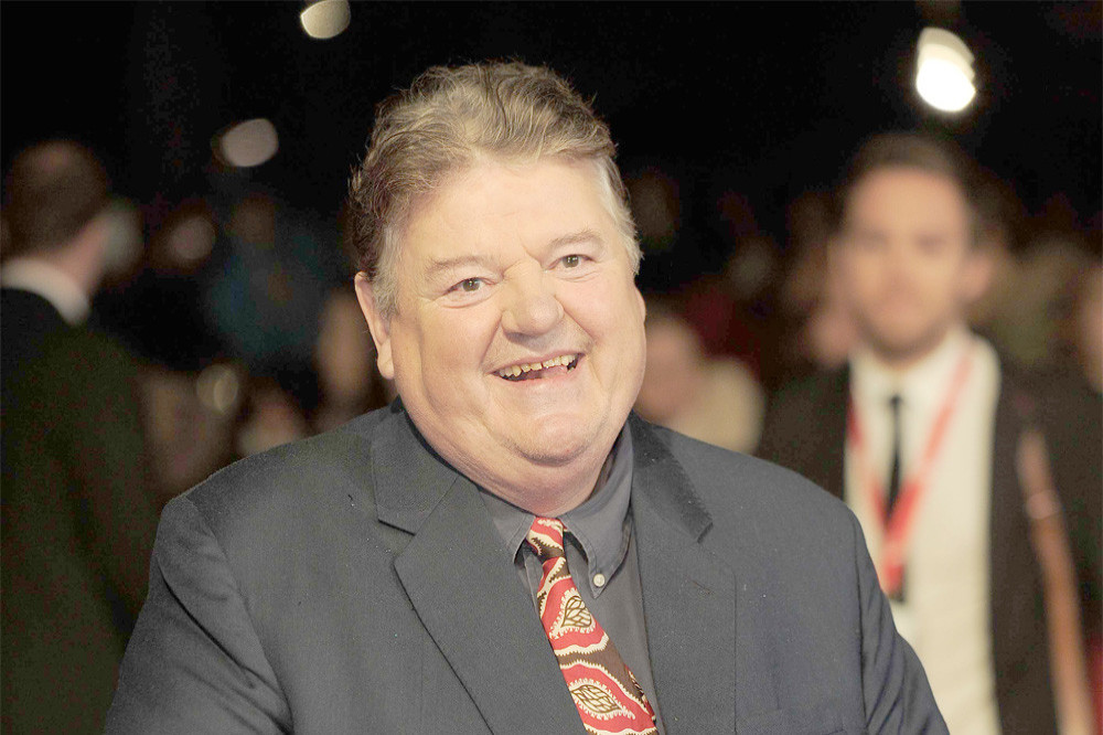 Robbie Coltrane’s son has wittily paid tribute to his late comedian dad by posting the message: ‘Just woke up what did I miss?’