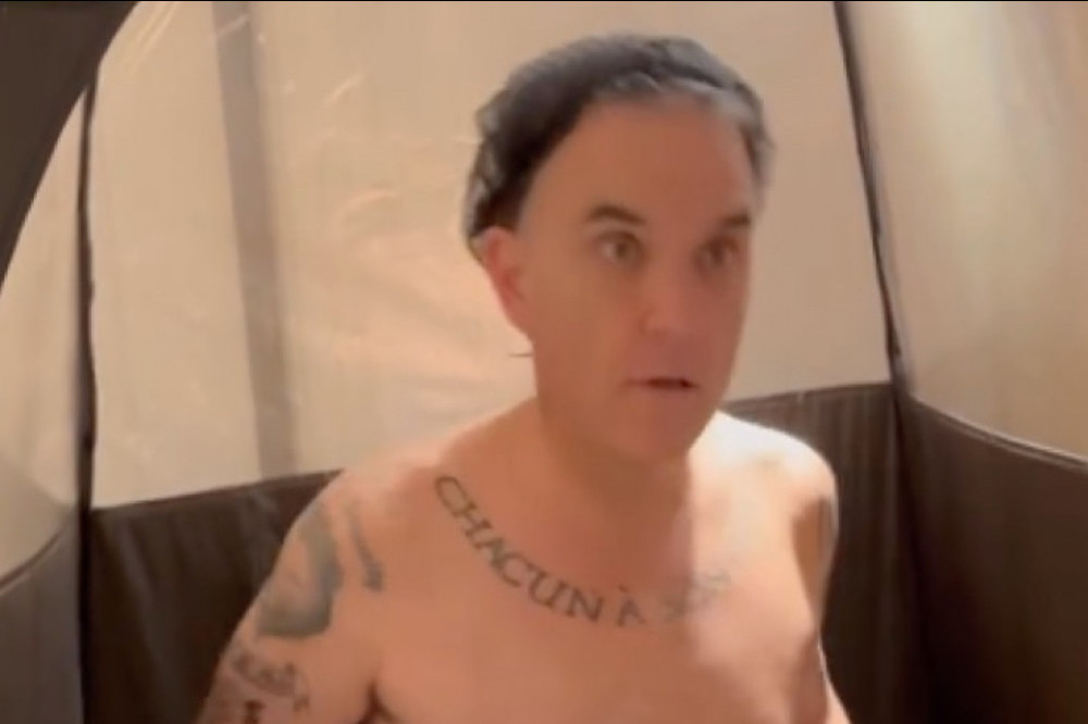 Robbie Williams has sparked worries for his health by stripping off to reveal his two stone weight loss – after he admitted to taking ‘something like’ Ozempic