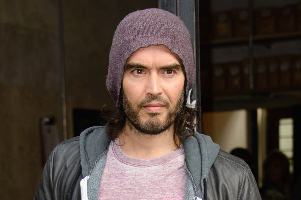 Russell Brand has been defended by his dad