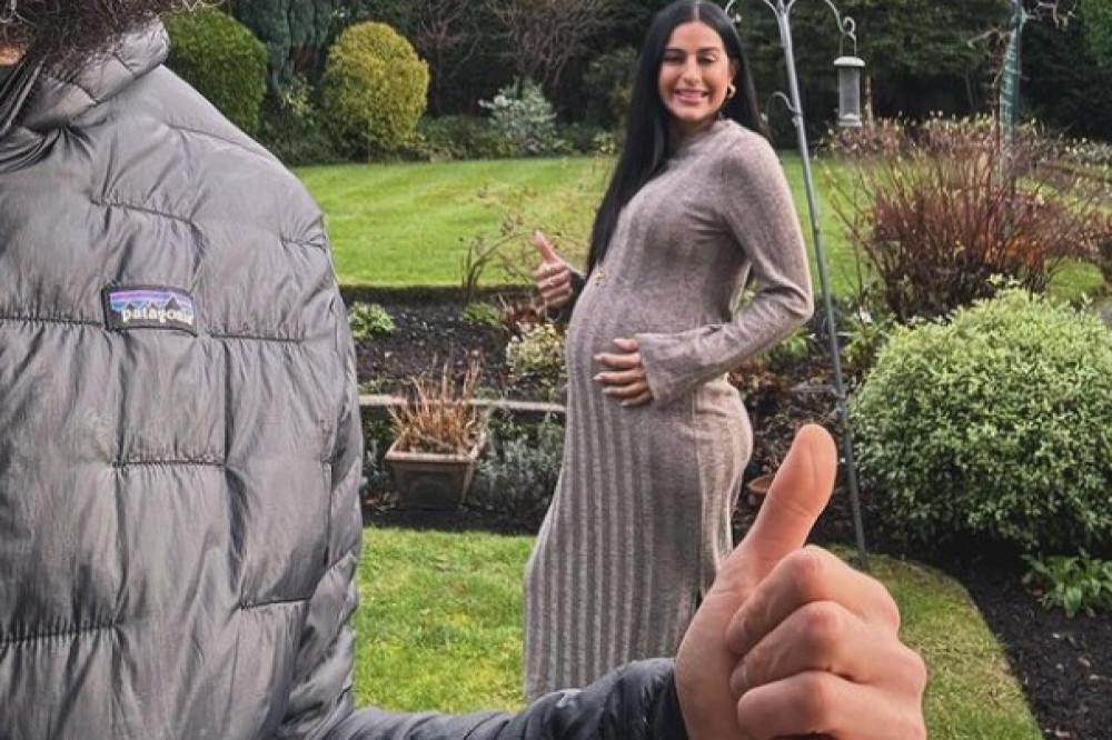 Sair Khan is expecting her first child with her longtime partner