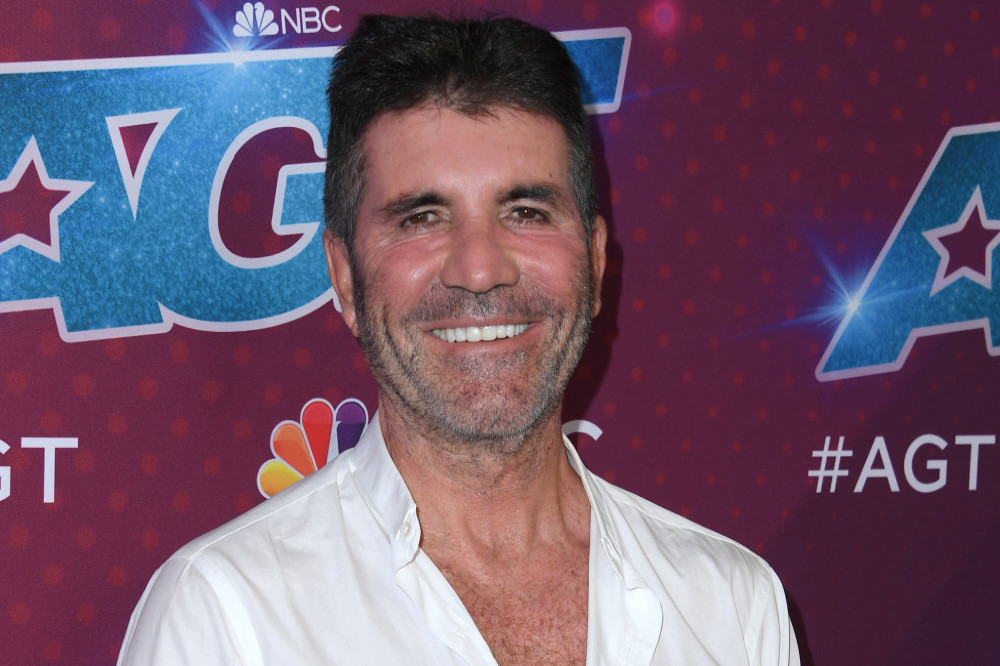 Simon Cowell started drinking and smoking aged eight