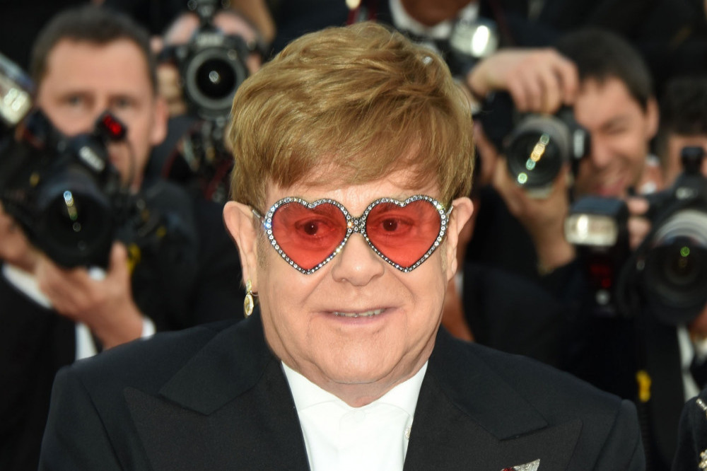 Sir Elton John can't attend his own party