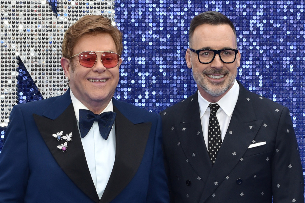 David Furnish manages Sir Elton John's business affairs
