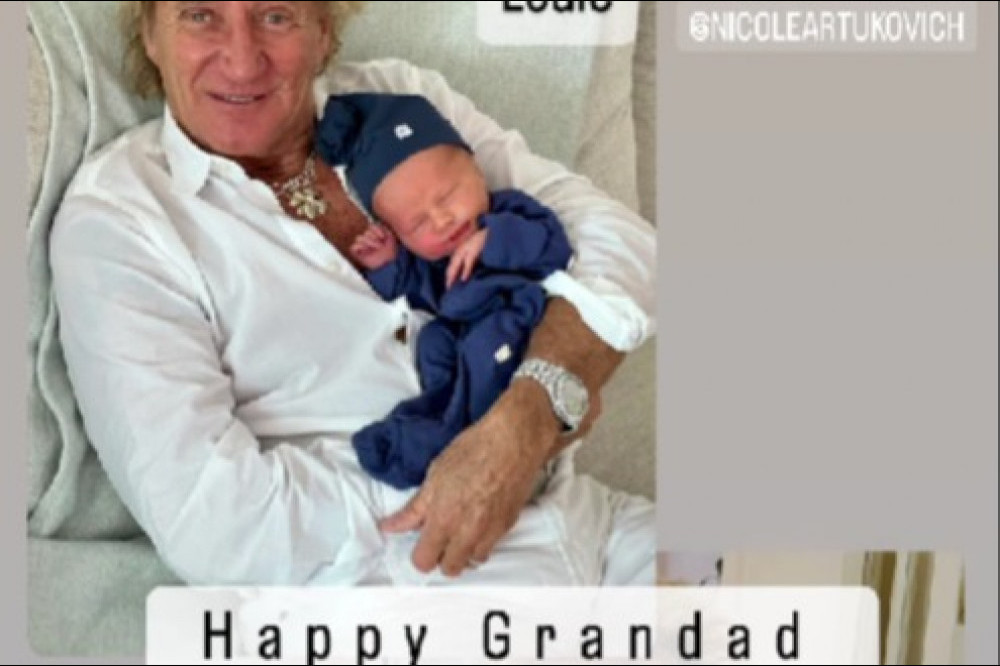 Sir Rod Stewart is a 'happy grandad'