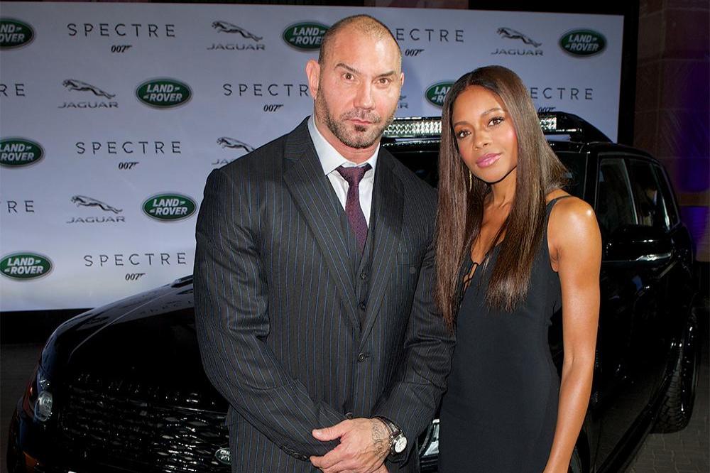 SPECTRE cast members David Bautista and Naomie Harris are reunited with Jaguar and Land Rover stunt vehicles from the film ahead of their internationa
