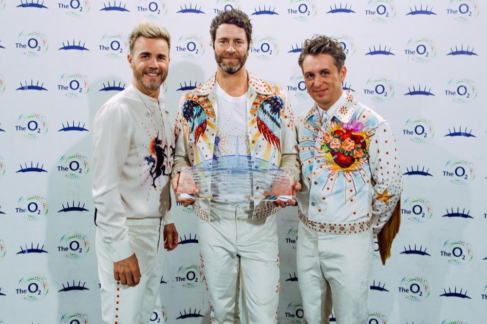 Take That receive award from The O2