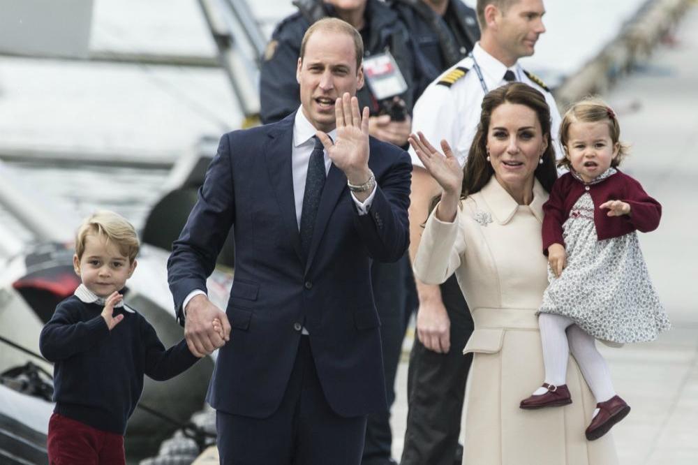 Prince George and Princess Charlotte with Prince William and Duchess Catherine