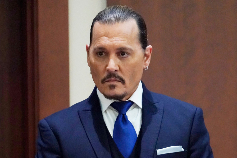 Whitney Henriquez alleged that Johnny Depp dangled a dog out of car while testifying in court in Fairfax