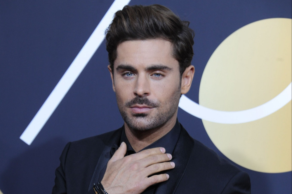 Zac Efron says his Baywatch body looked fake.