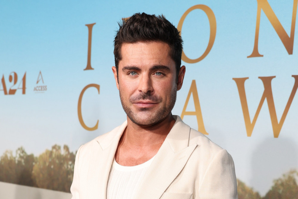 Zac Efron would be 'honoured' to play Matthew Perry