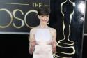 Anne Hathway showcased her enviable figure at the Oscars last night