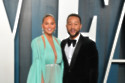 John Legend was ironing his clothes half-naked when he met his future wife Chrissy Teigen