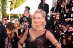 Charlize Theron says playing James Bond would be 'cray'