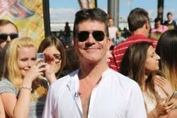 Simon Cowell reveals low blood pressure caused fall