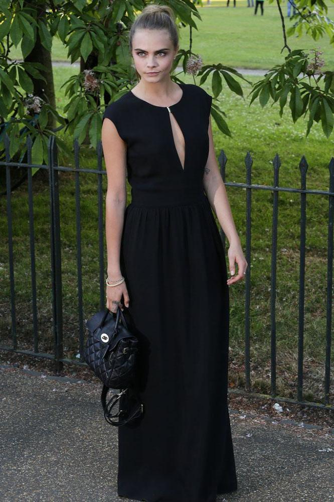 Cara Delevingne carries one of her Mulberry designs
