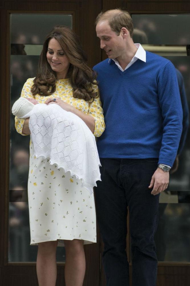 Prince William with Duchess Catherine and Princess Charlotte