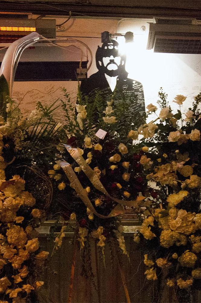 Floral tributes left to Lemmy at the nearby Rainbow Bar