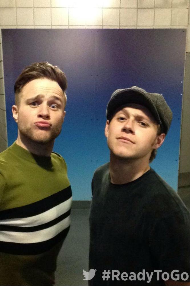 Olly Murs and Niall Horan using the Twitter Mirror at London's O2 Arena