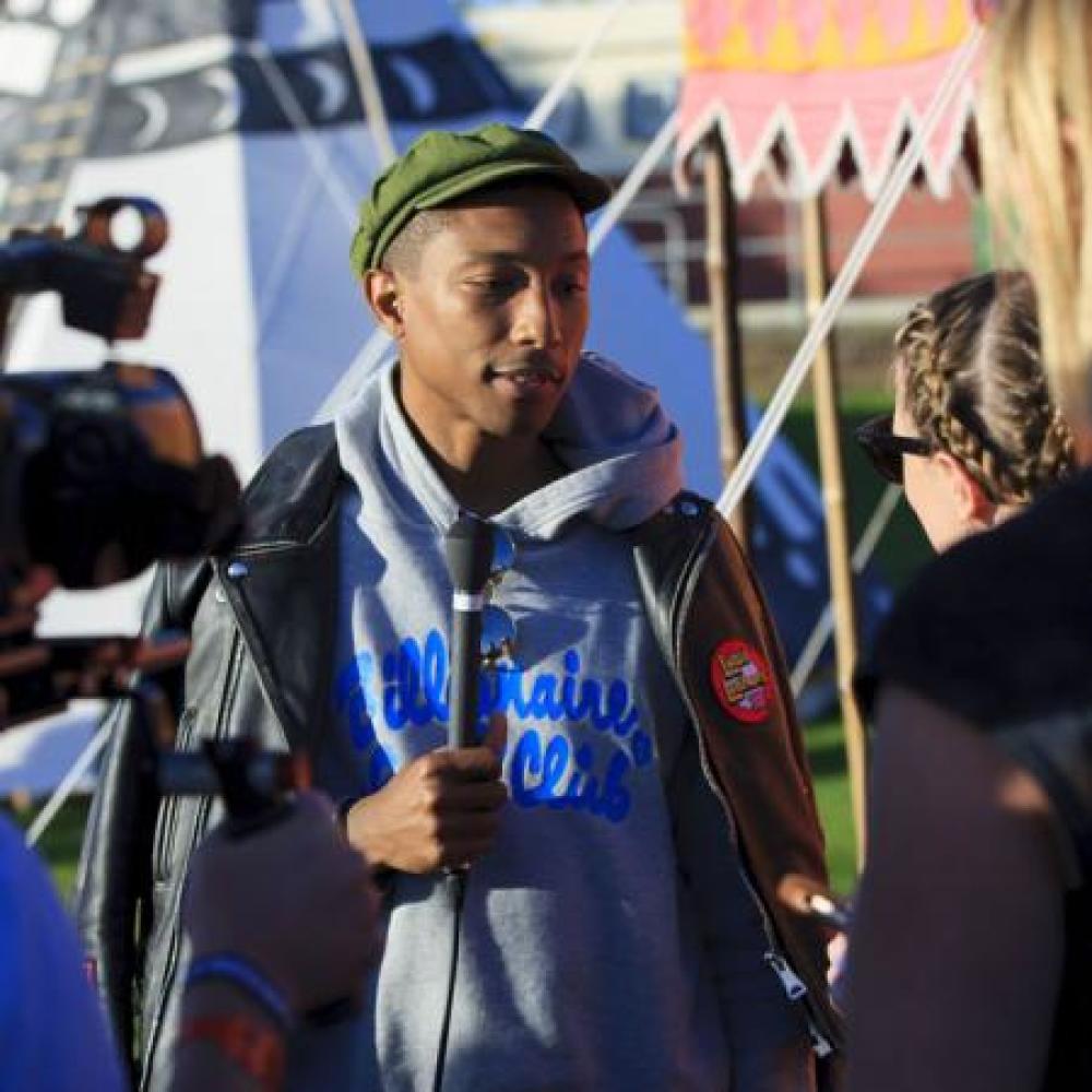 Pharrell speaking to KISS FM UK at the Isle of Wight Festival