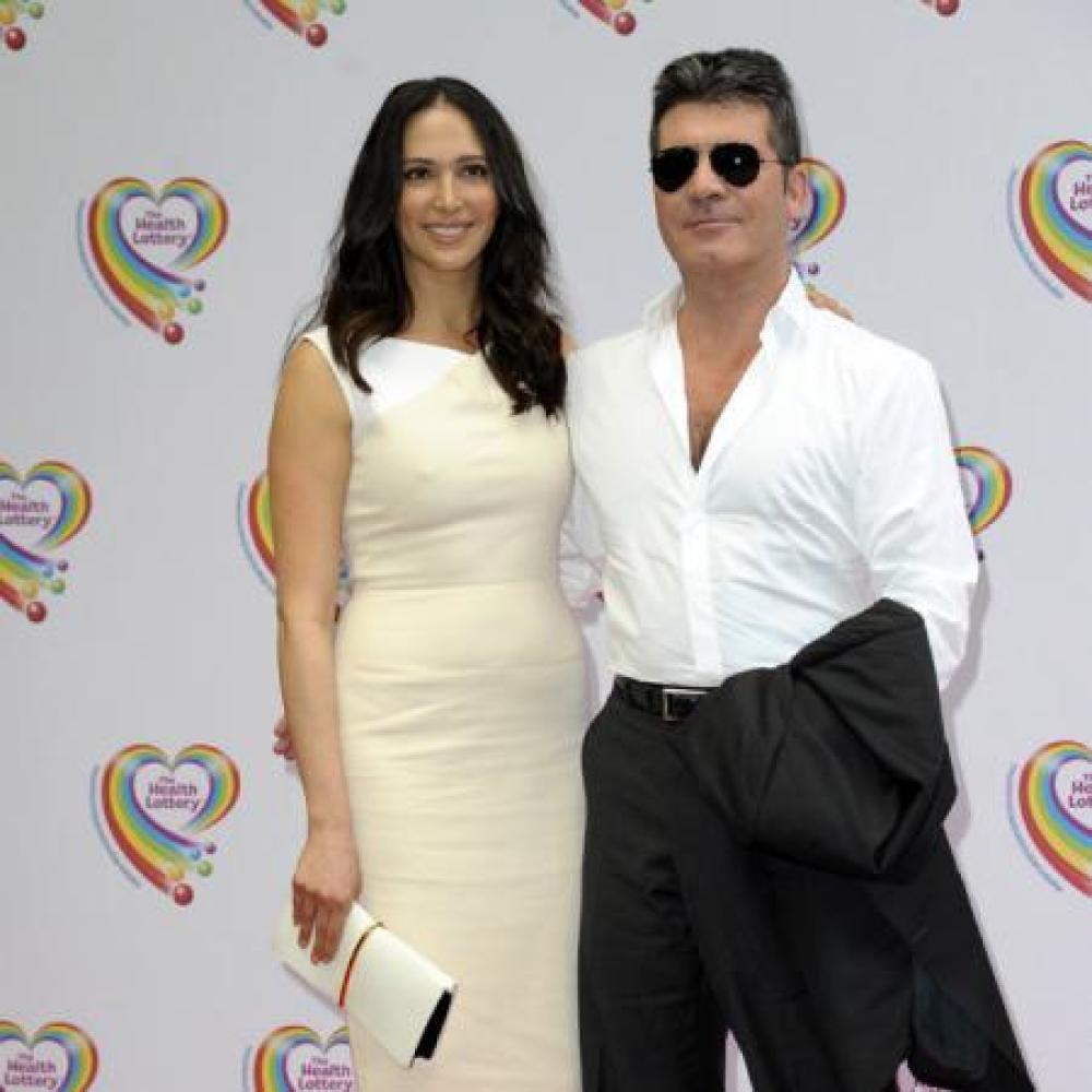 Simon Cowell with Lauren Silverman at Health Lottery Tea Party