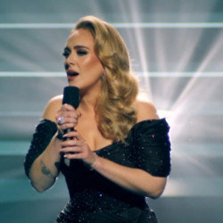 Adele matches chart record of Mariah Carey