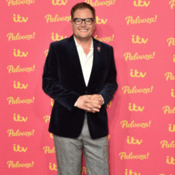 Alan Carr has hired a personal trainer following split from husband