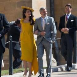 Amal and George Clooney attend royal wedding