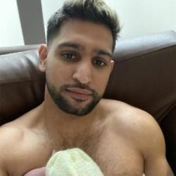 Amir Khan and newborn son (c) Instagram