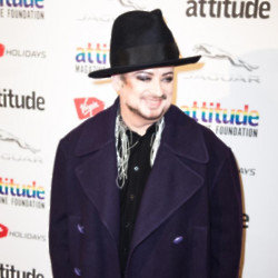 Boy George dressed in disguise on arrival in Australia for 'I'm A Celeb...'