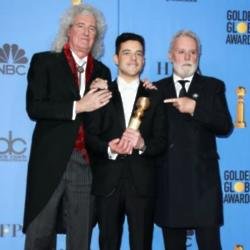 Brian May, Rami Malek, and Roger Taylor
