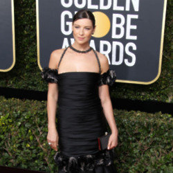 Caitriona Balfe protects her younger co-stars