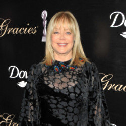 Candy Spelling divorced her first husband because he was gay