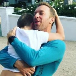 Chris Martin hugs son Moses (c) Instagram/Gwyneth Paltrow