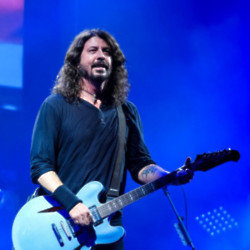 Dave Grohl choked back tears as he paid tribute to Taylor Hawkins