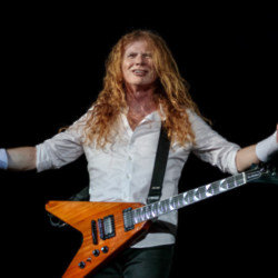 Dave Mustaine won't stop playing guitar until it's impossible