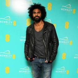 David Haye at the Hilton rooftop bar to celebrate the transformation of the iconic arch at Wembley Stadium connected by EE