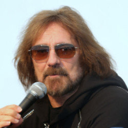 Geezer Butler has had COVID-19 and injured his ribs, according to bandmate Tony Iommi
