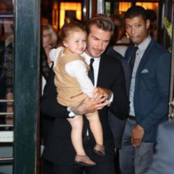 Harper and David Beckham after Victoria's fashion show