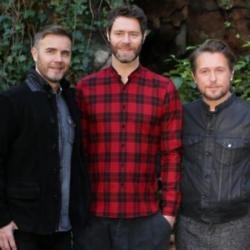 Howard (centre) with Gary Barlow (left) and Mark Owen (right) (c) Twitter