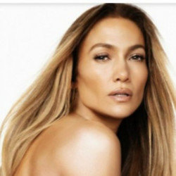 Jennifer Lopez is happier than ever as she poses naked on her 53rd birthday. (C) Jennifer Lopez/Instagram