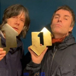 John Squire and Liam Gallagher with their album award