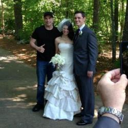 John Travolta with bride and groom