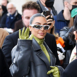 Kim Kardashian holds hands with Pete Davidson at The Kardashian premiere