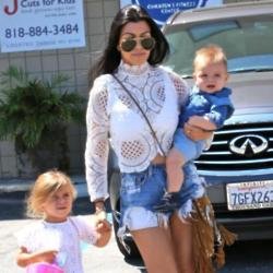 Kourtney Kardashian with daughter Penelope and son Reign