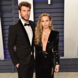 Liam Hemsworth and Miley Cyrus at Vanity Fair party